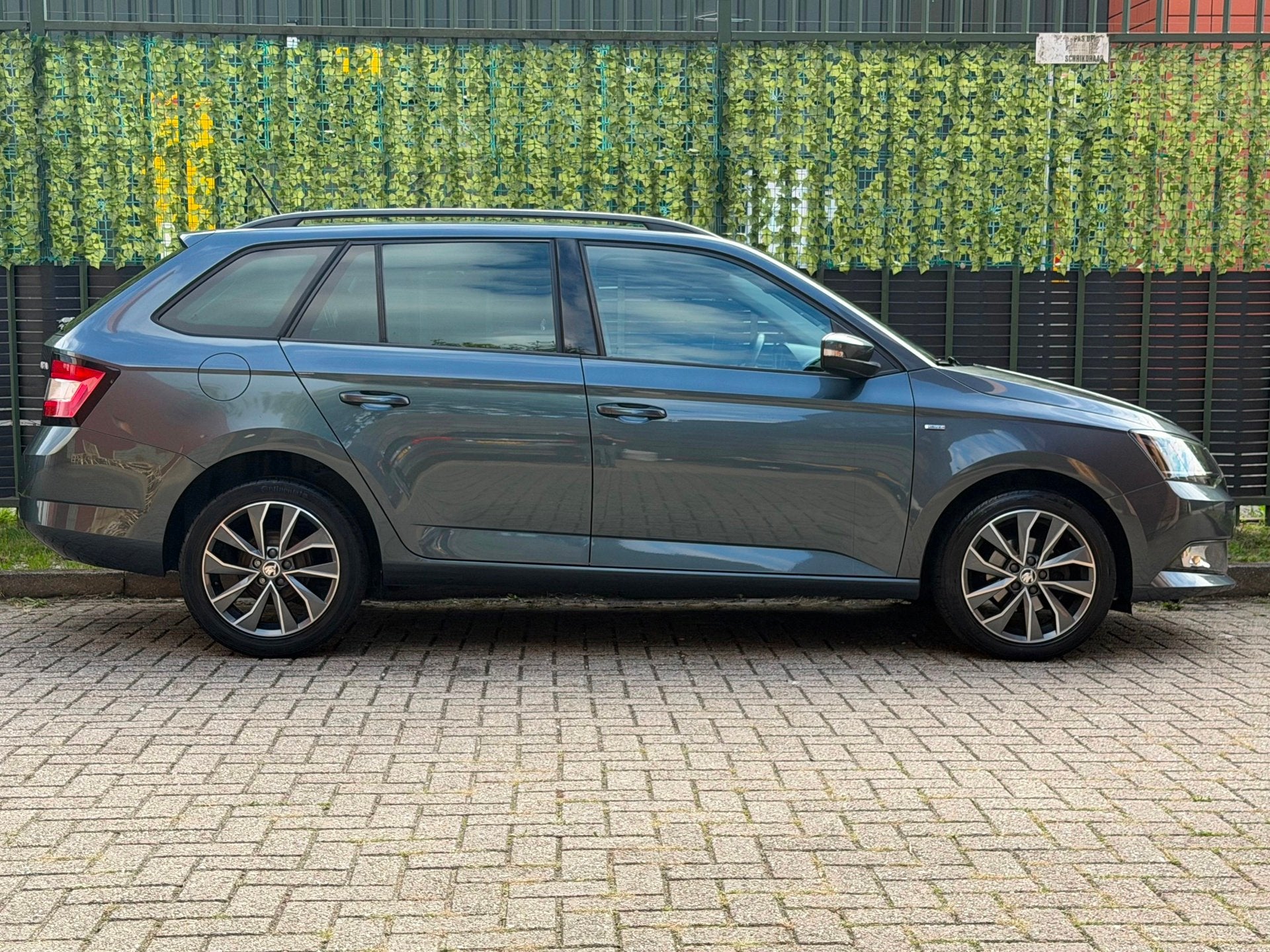 Foto 5 van Skoda Fabia Combi 1.0 TSI Drive grijs 2017 CRUISE|NAVI|NAP