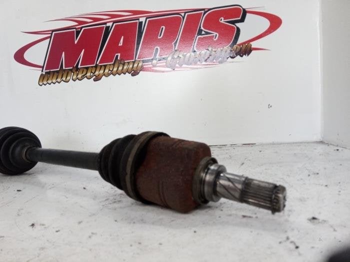 Aandrijfas links-voor van een Nissan Almera Tino, Auto-onderdelen, Gebruikt, -, -, Ophalen of Verzenden