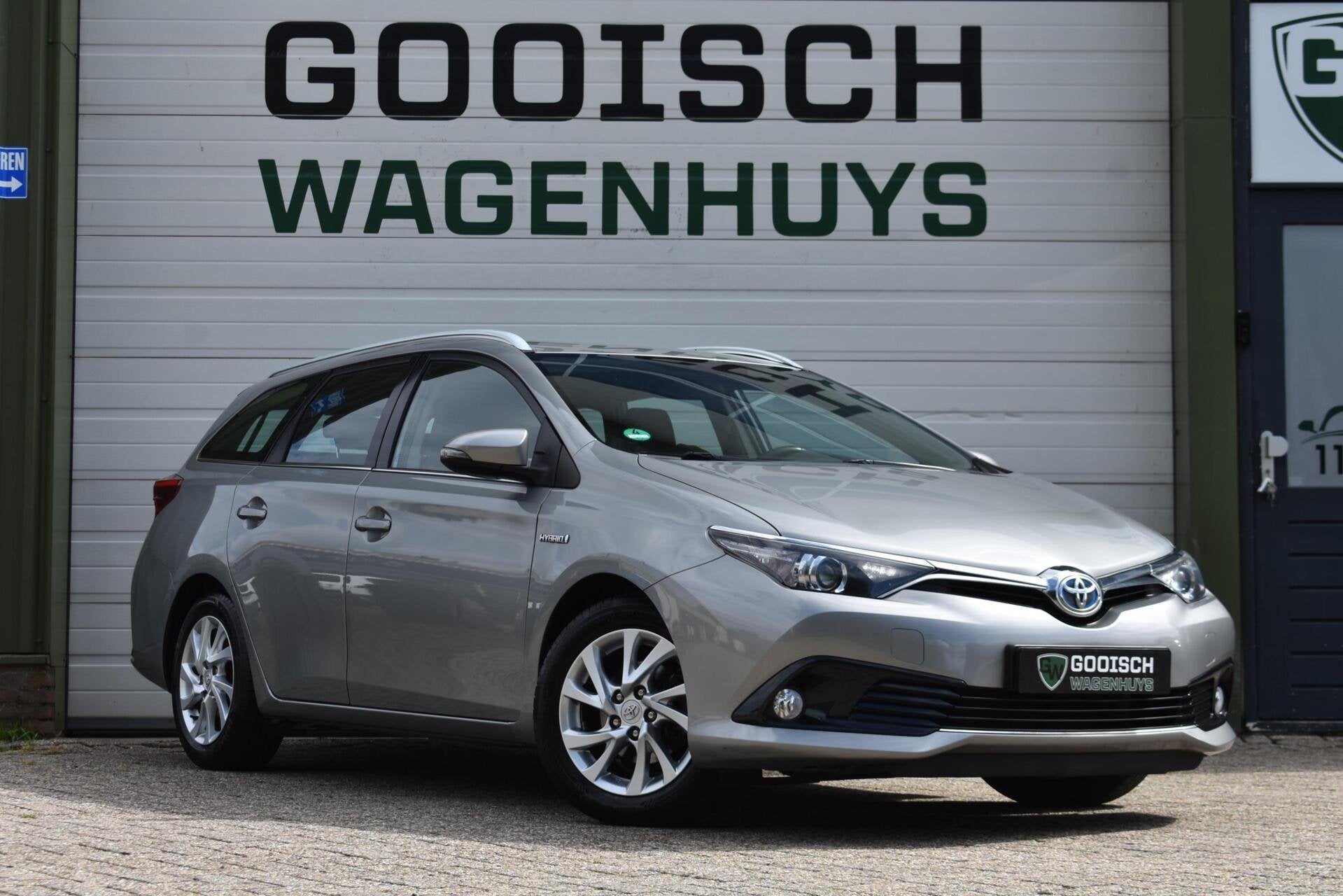 Toyota Auris 1.8 Hybrid Dynamic | Camera | Navigatie | Clima, Euro 6, Met garantie (alle), Hybride Elektrisch/Benzine, Start-stop-systeem