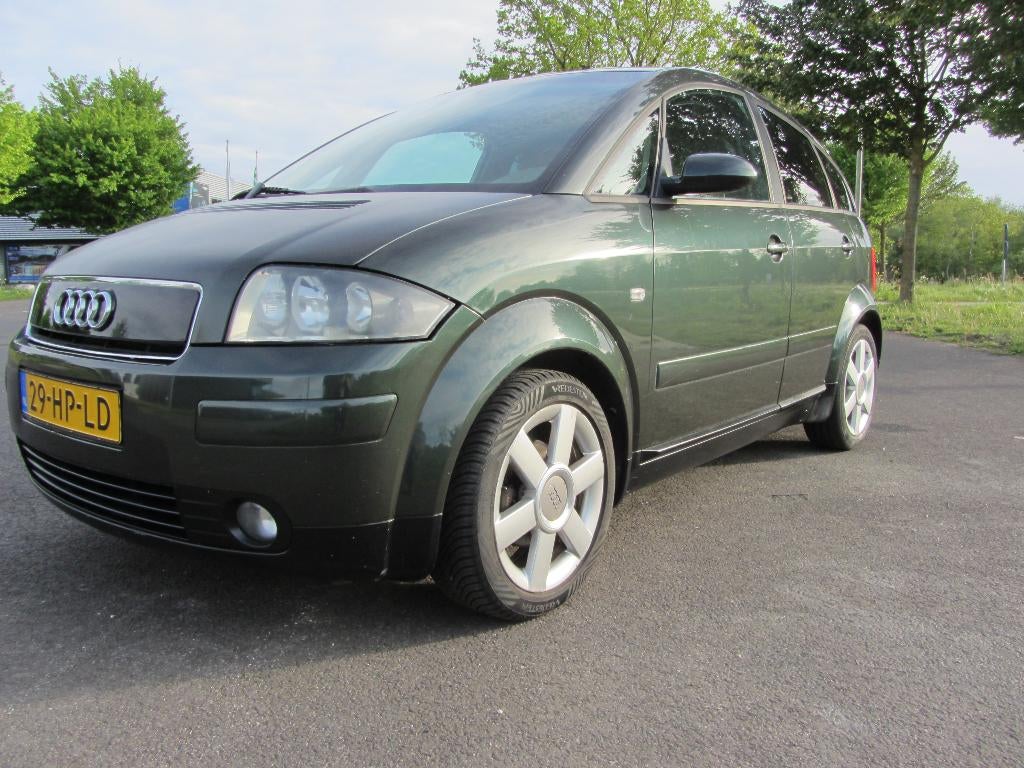 Audi A2 1.4 55KW 2001 Groen, Nieuwe APK, Auto's, Audi, Voorwielaandrijving, Stof, 74 pk, 4 cilinders