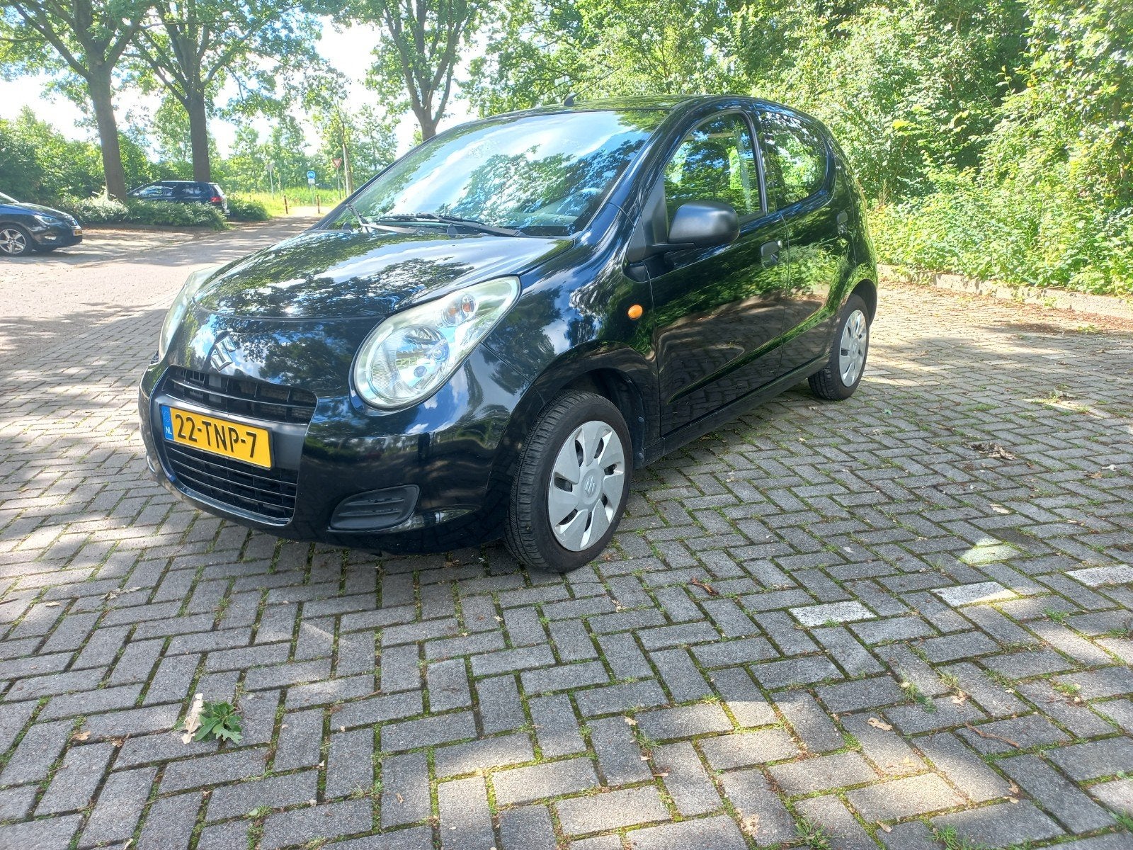 Suzuki Alto 1.0 2012 Zwart met AIRCO, Voorwielaandrijving, Stof, 4 stoelen, Origineel Nederlands