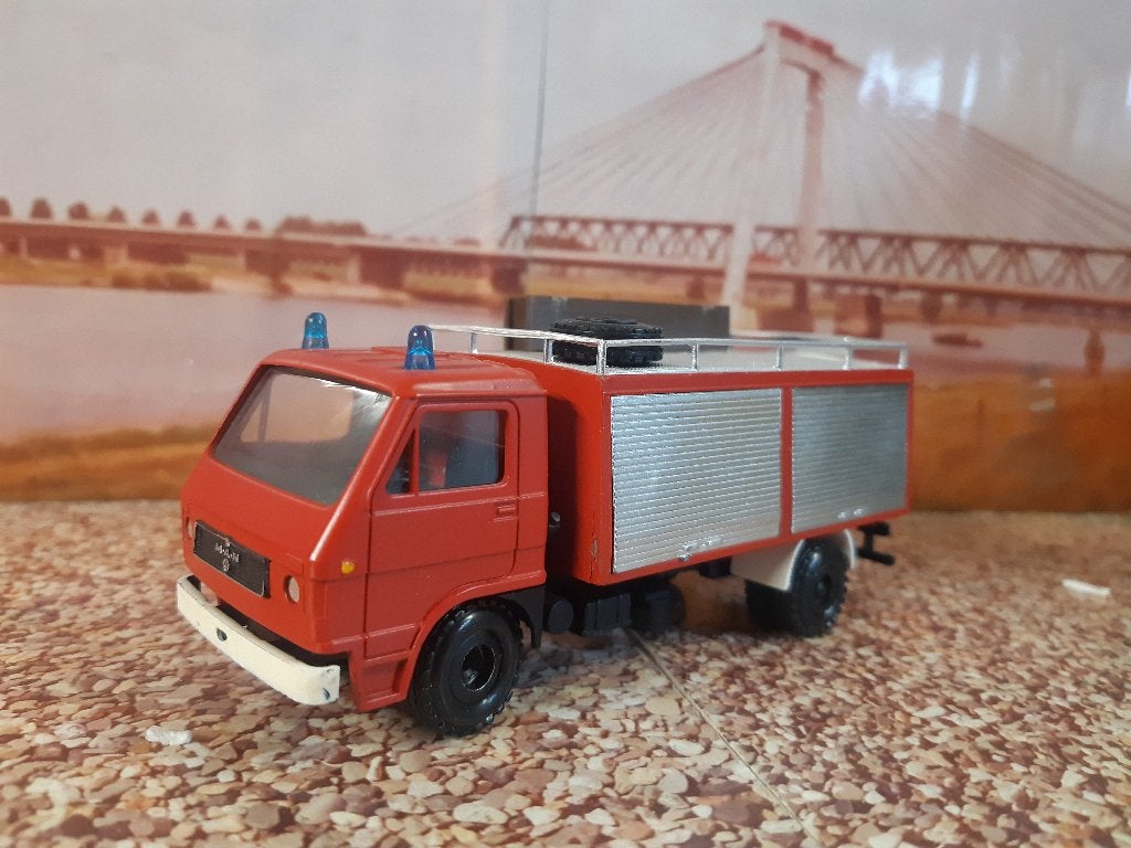conrad  MAN-VW brandweer wagen, Ophalen of Verzenden, Zo goed als nieuw, Bus of Vrachtwagen, Conrad