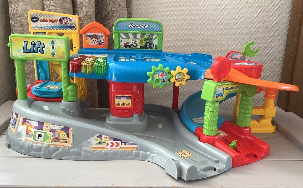 VTECH  garage met licht en geluid, Ophalen, Zo goed als nieuw, 6 maanden tot 2 jaar