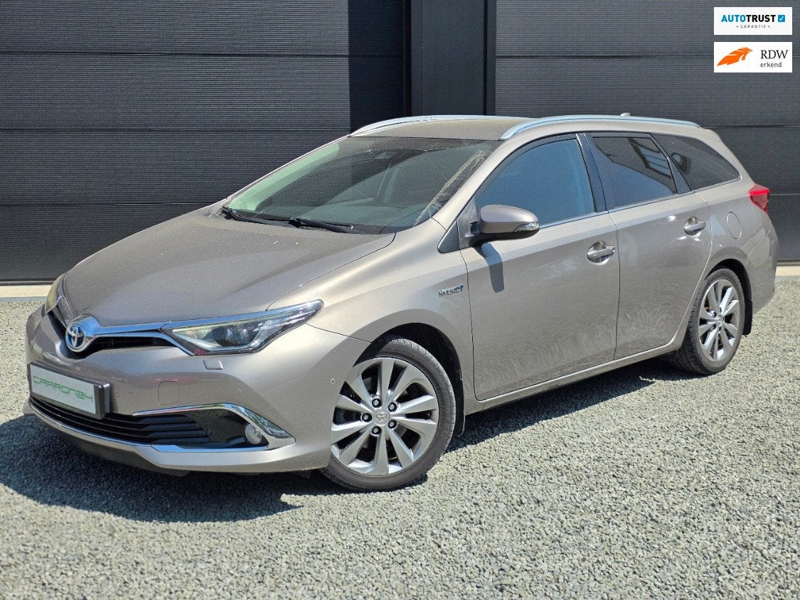 Toyota Auris Touring Sports 1.8 Hybrid Executive, Auto's, Toyota, 28 km/l, Gebruikt, Zwart, 4 cilinders