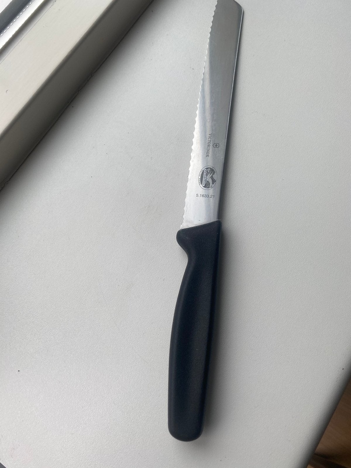 Victorinox broodmes 21 cm als nieuw, Ophalen of Verzenden, Zo goed als nieuw, Rvs of Chroom