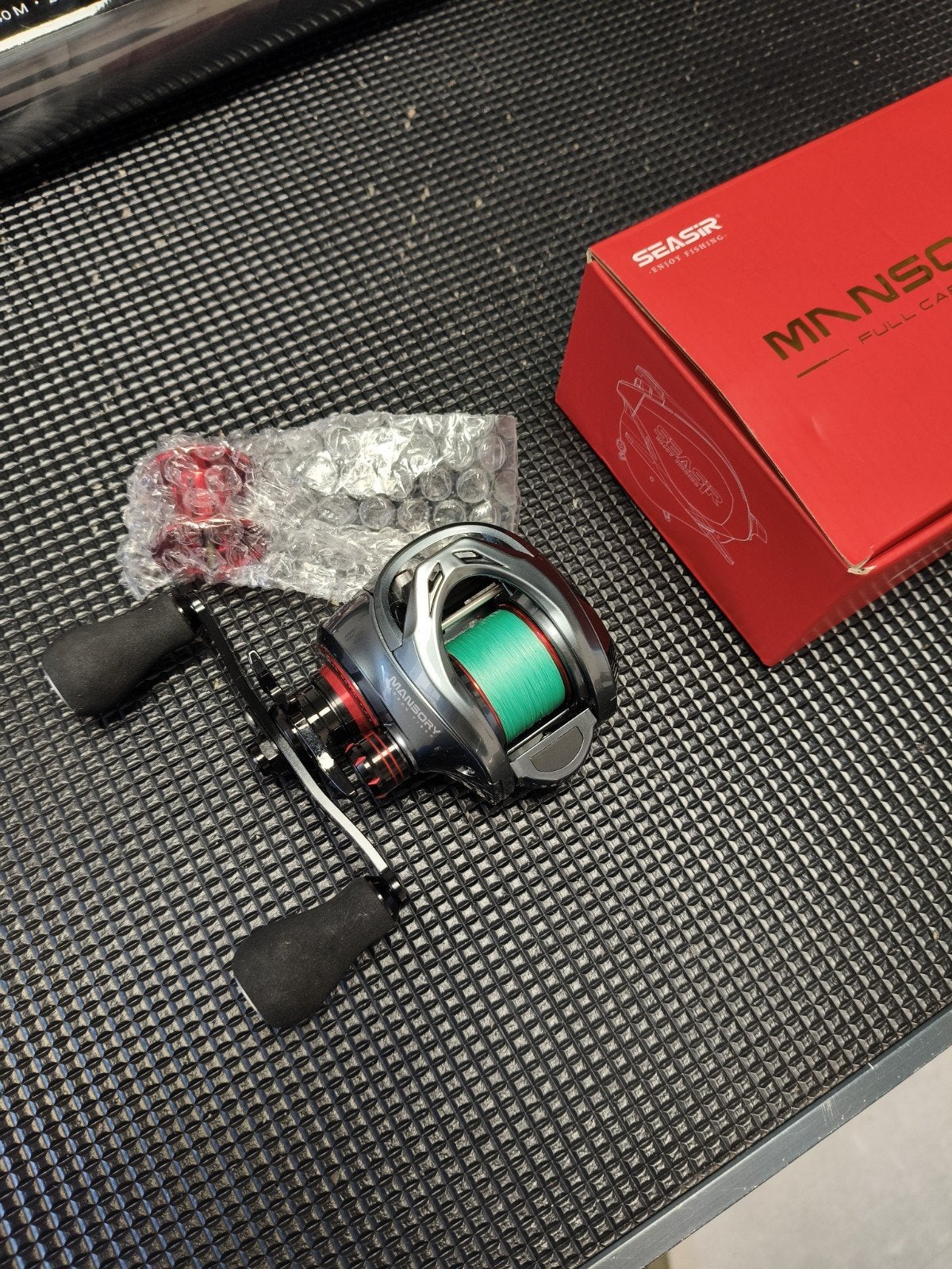 SEASIR Mansory Baitcaster met Daiwa handle + extra spoel, Ophalen of Verzenden, Zo goed als nieuw, Molen