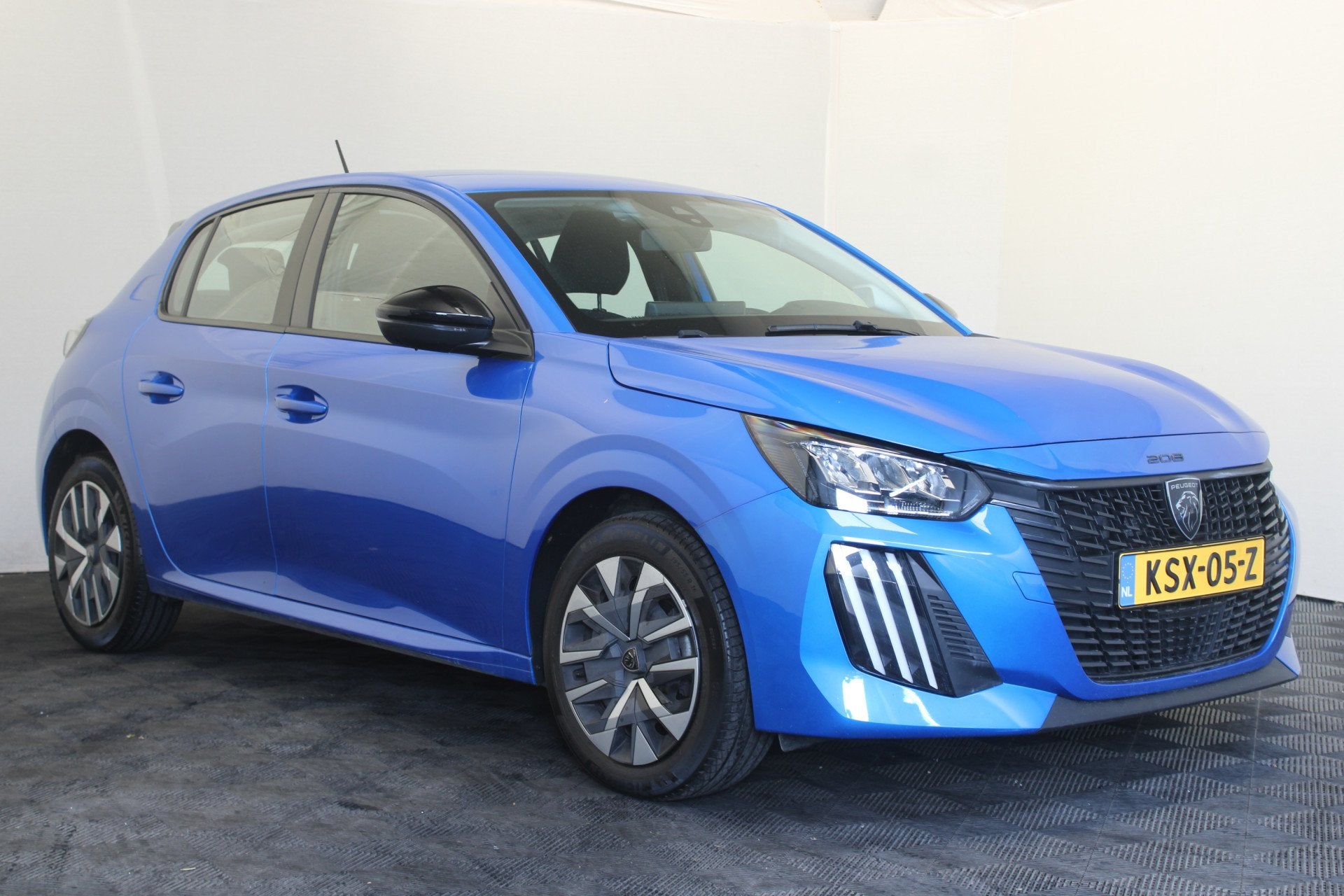 Peugeot 208 1.2 PureTech 75 Active (bj 2024), Auto's, Voorwielaandrijving, Stof, Gebruikt, Blauw