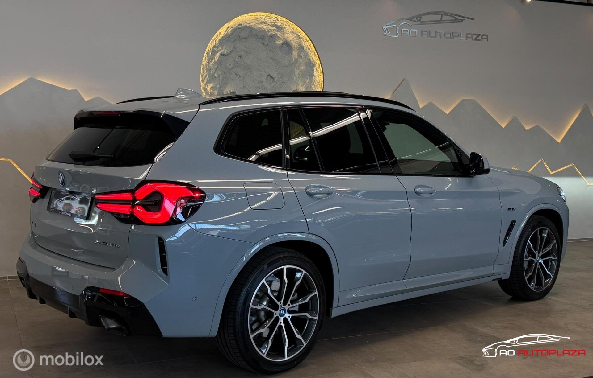 BMW X3 xDrive30e M Sport Brooklyn grey Panorama/Keyless/Trek, Automaat, 1998 cc, Zwart, Leder