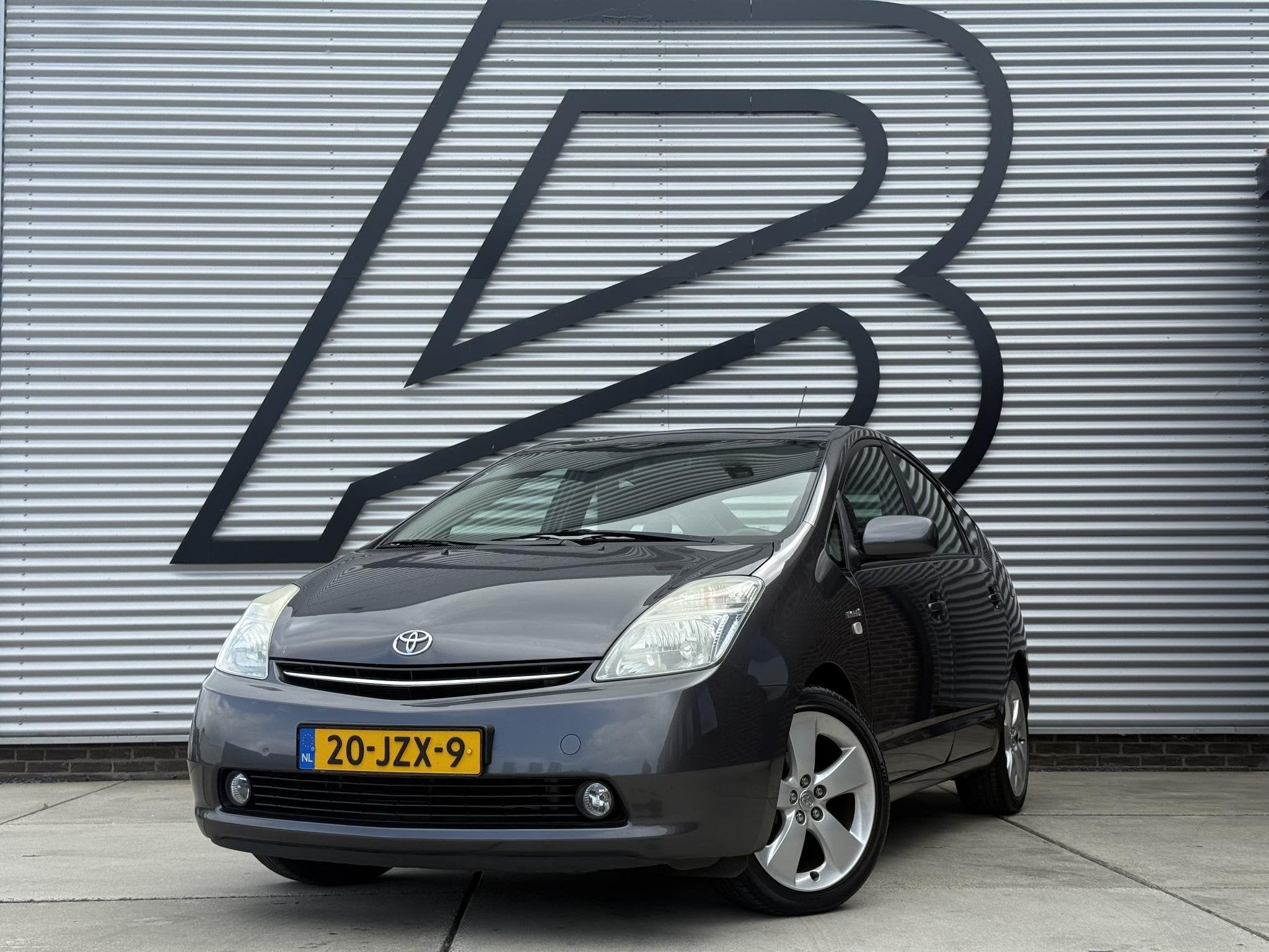 Toyota Prius 1.5 VVT-i Business Edition 2e Eigenaar|Navi|Cru, Auto's, Gebruikt, 4 cilinders, 23 km/l, Origineel Nederlands