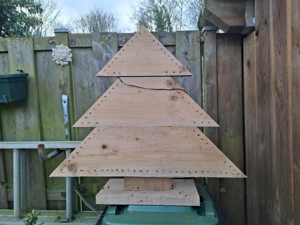 Kerstboom met lampjes, Ophalen