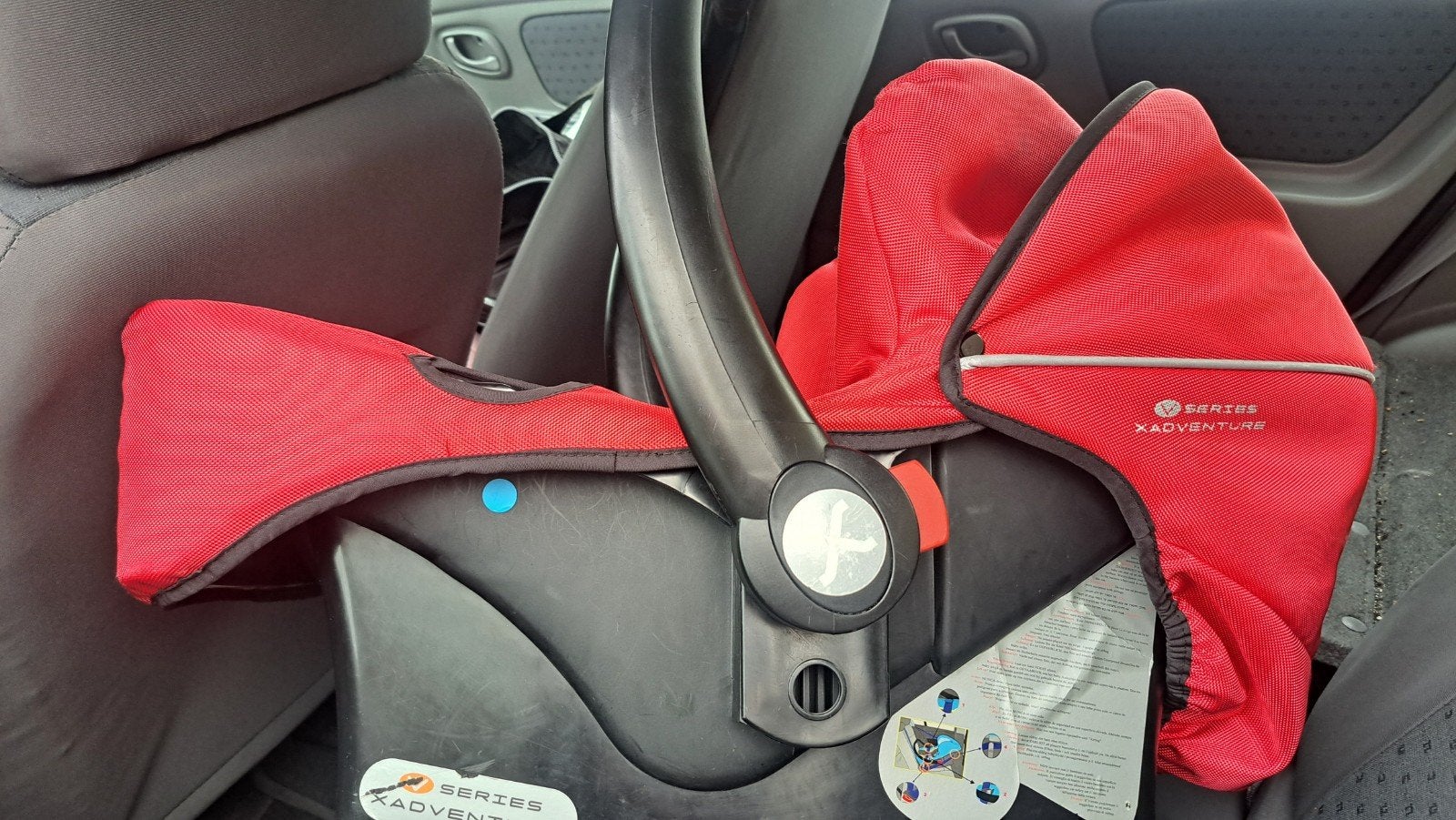 Rode baby autostoel - X-Adventure, Ophalen of Verzenden