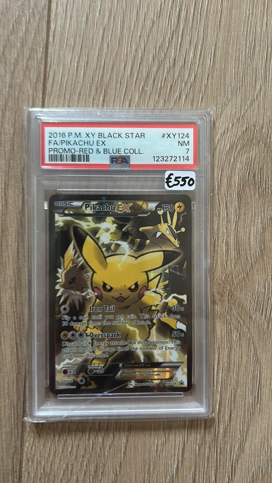 Pikachu #XY124 PSA 7 red & blue Collection, Ophalen of Verzenden, Zo goed als nieuw