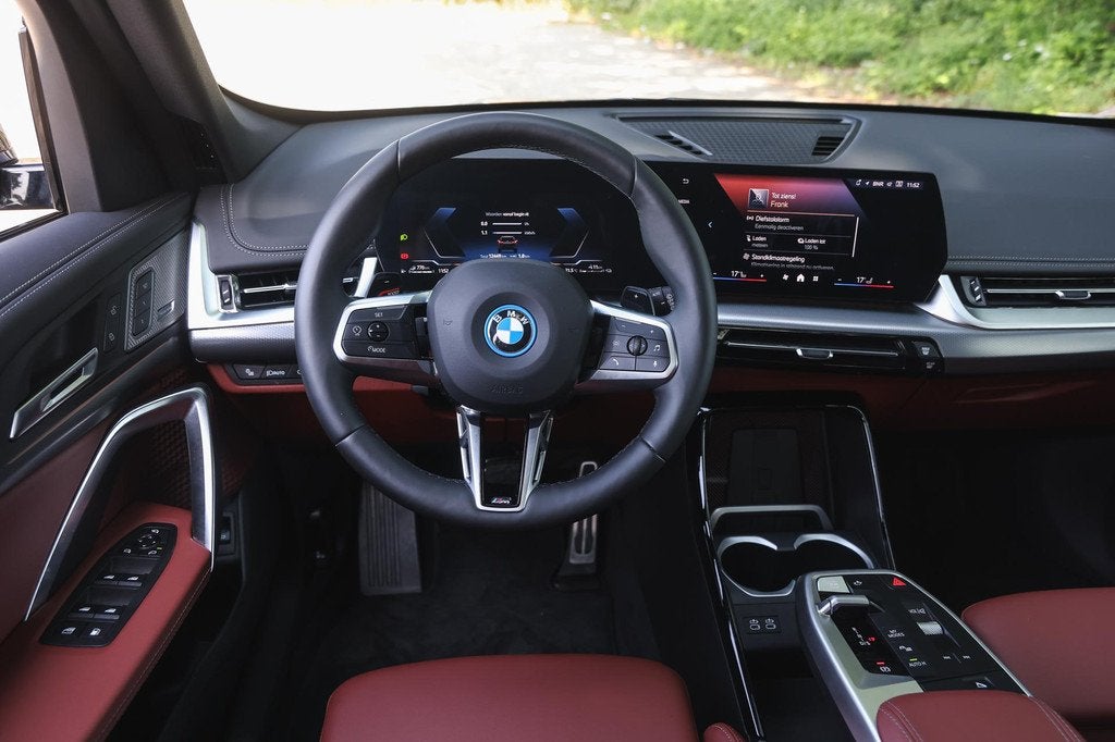 BMW X1 xDrive25e M Sport Automaat / Panoramadak / Sportstoel, Gebruikt, Euro 6, Zwart, Hybride Elektrisch/Benzine
