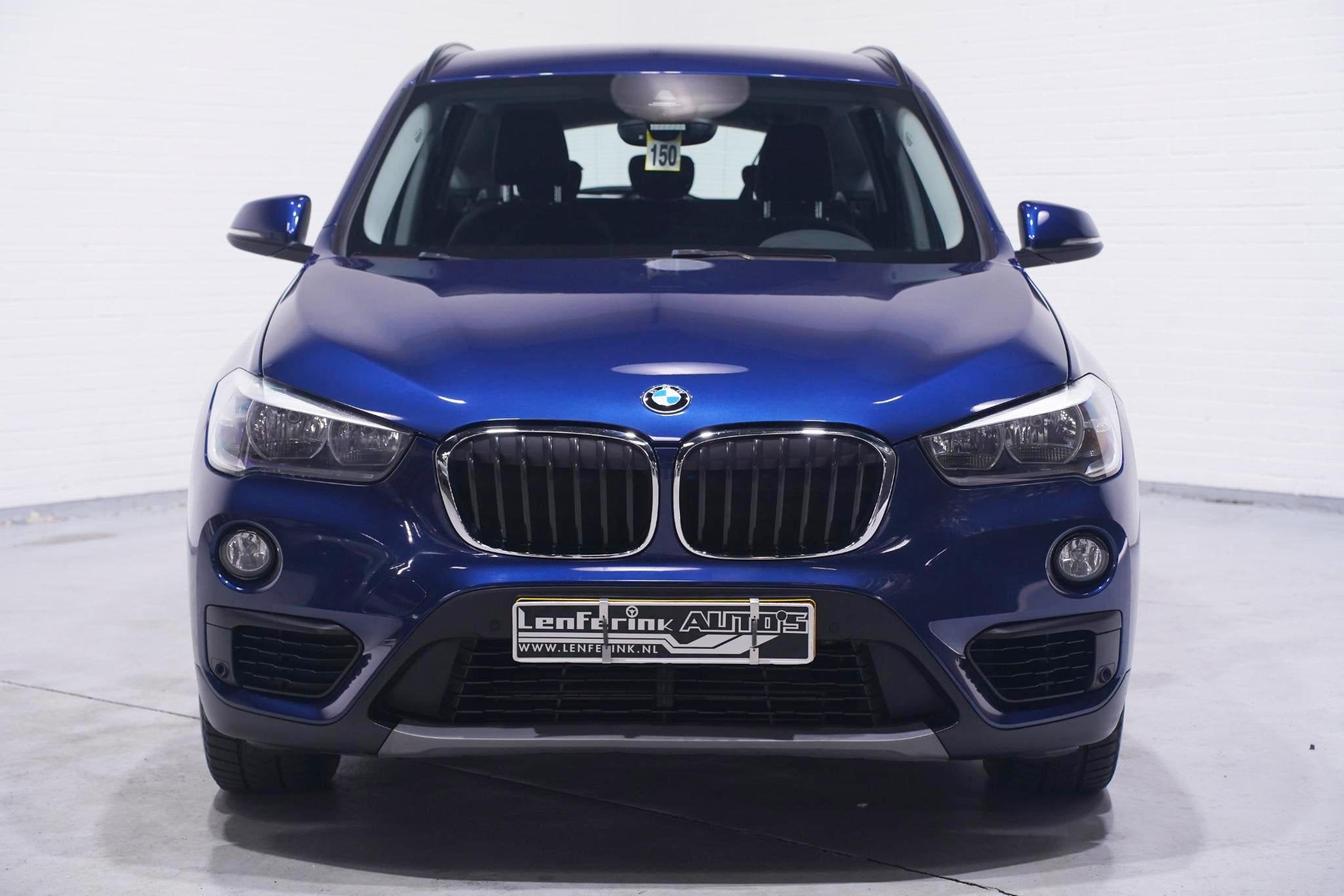 BMW X1 sDrive18i Advantage Navi Sportstoelen Clima Stoelverw, Auto's, Stof, Gebruikt, Euro 6, Blauw