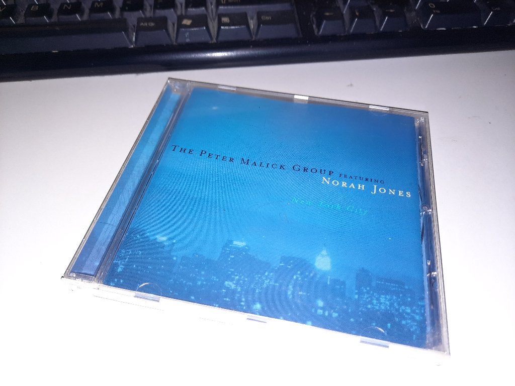 The CD Peter Malick Group  Norah Jones – New York City, Ophalen, Zo goed als nieuw