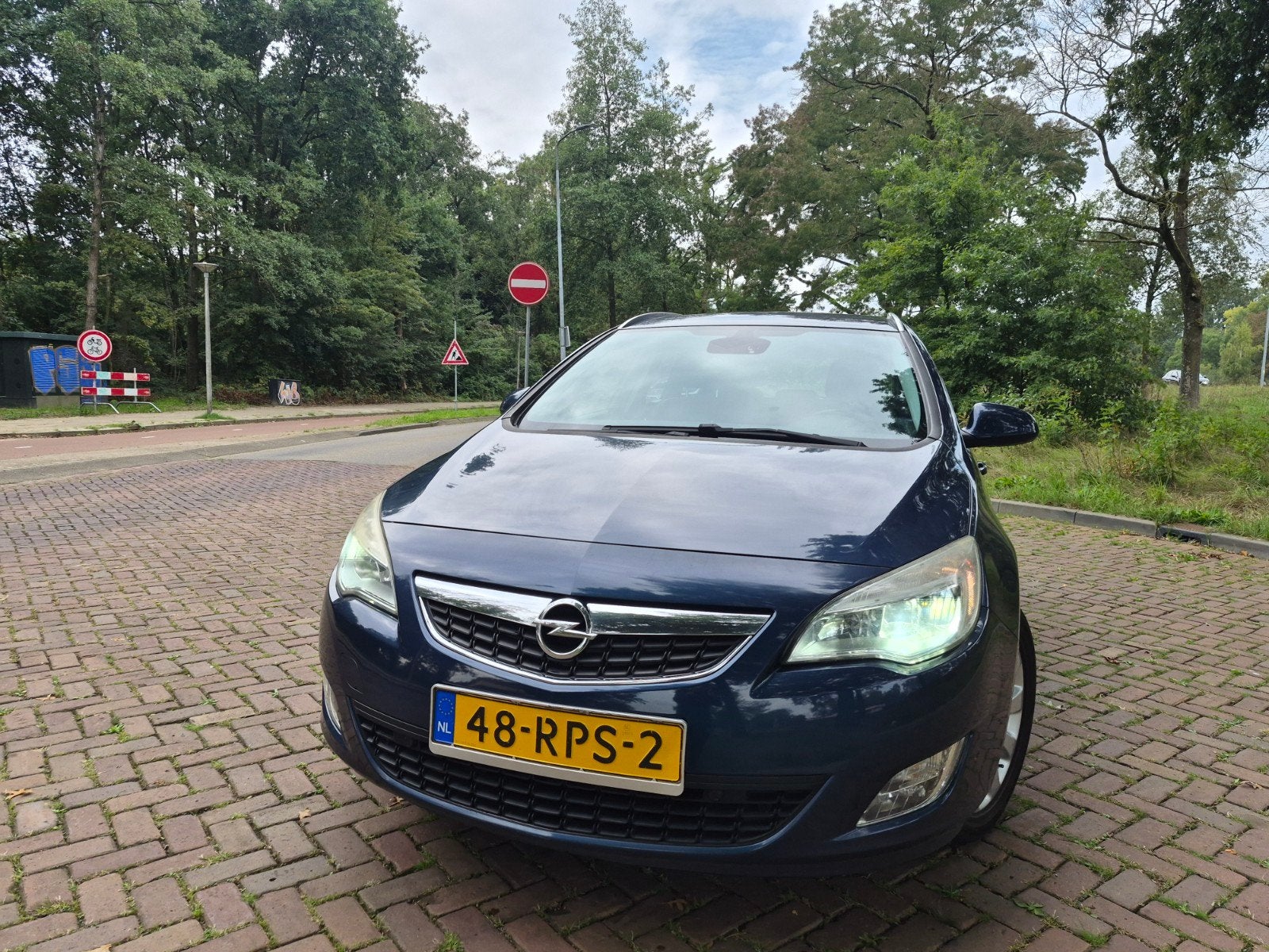 Opel Astra 1.4 Turbo 88KW Sports Tourer 2011 Blauw, Auto's, Voorwielaandrijving, Zwart, 4 cilinders, Blauw