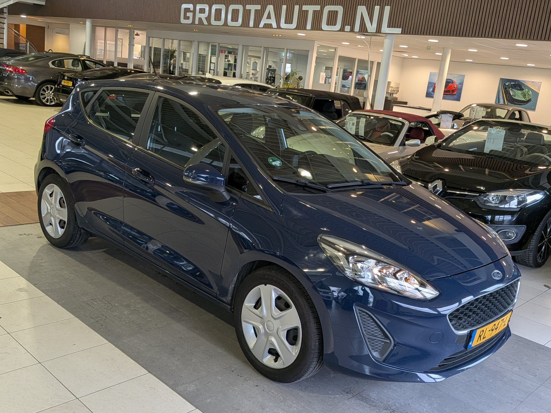 Ford Fiesta 1.1 Trend BTW Auto Airco, Cruise Control, Stuurb, Voorwielaandrijving, Stof, Blauw, 23 km/l