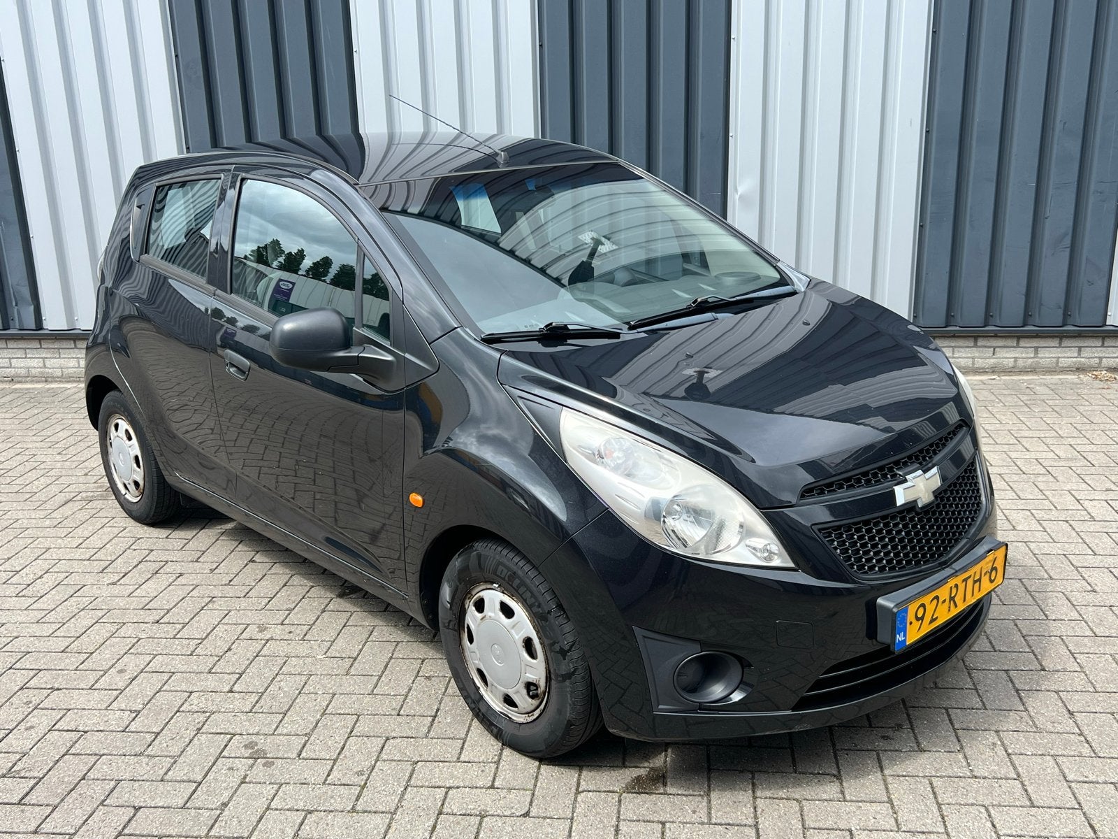 Chevrolet Spark 1.0 Bifuel 2011 Zwart APK 10/2026, Auto's, 15 km/l, 37 €/maand, 4 cilinders, Zwart