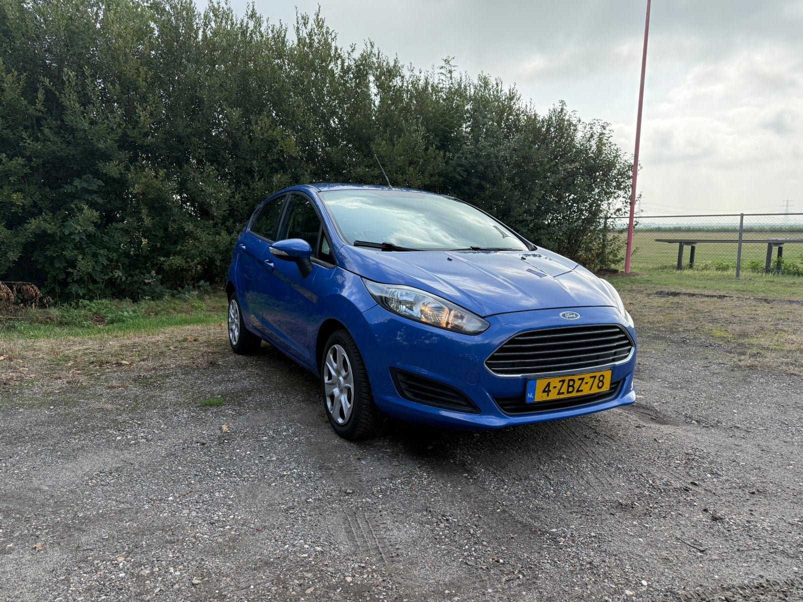 Ford Fiësta 1.25 60KW 5DR 2013 Blauw, Auto's, Voorwielaandrijving, Stof, Blauw, Bedrijf