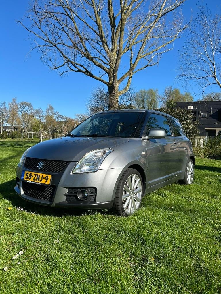 Suzuki Swift 1.6 3D Sport 2010 Grijs, Voorwielaandrijving, 1005 kg, 40 €/maand, Zwart
