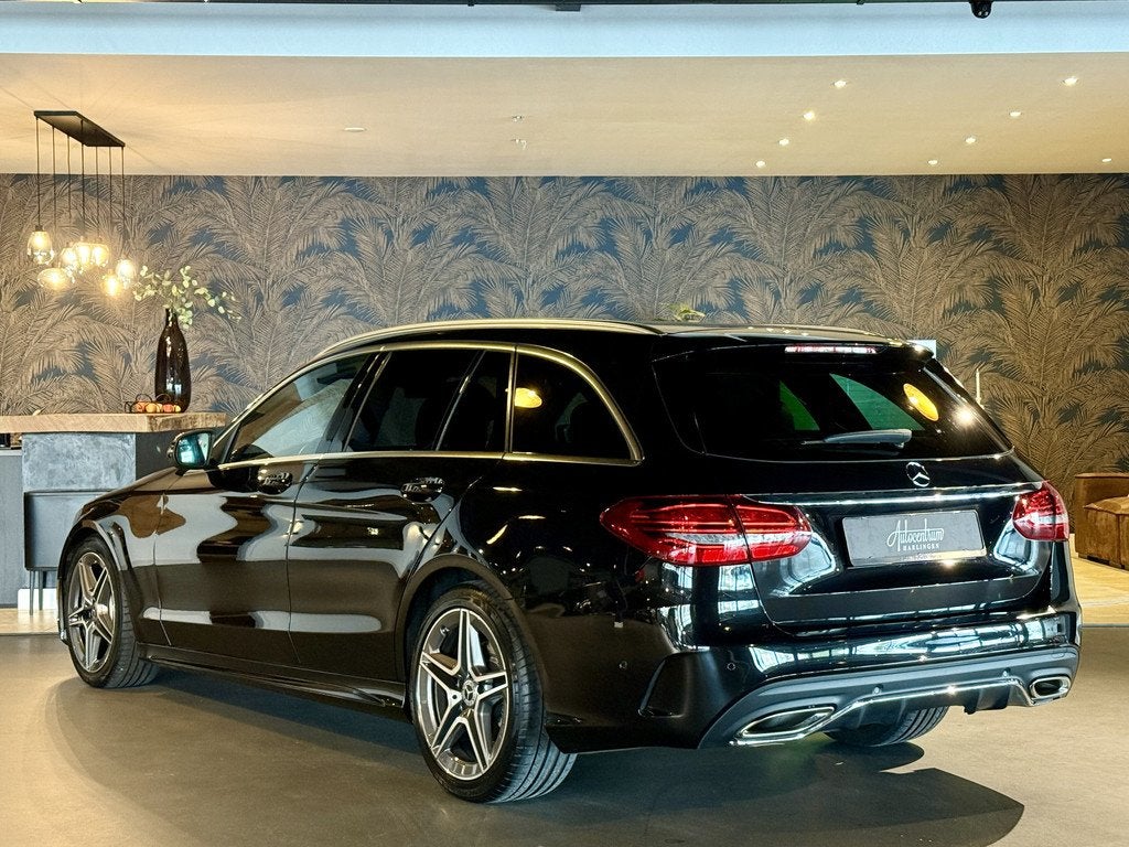 Mercedes-Benz C-Klasse Estate 200 AMG I Facelift I Virtual C, Auto's, Mercedes-Benz, 4 cilinders, 1465 kg, Zwart, Leder