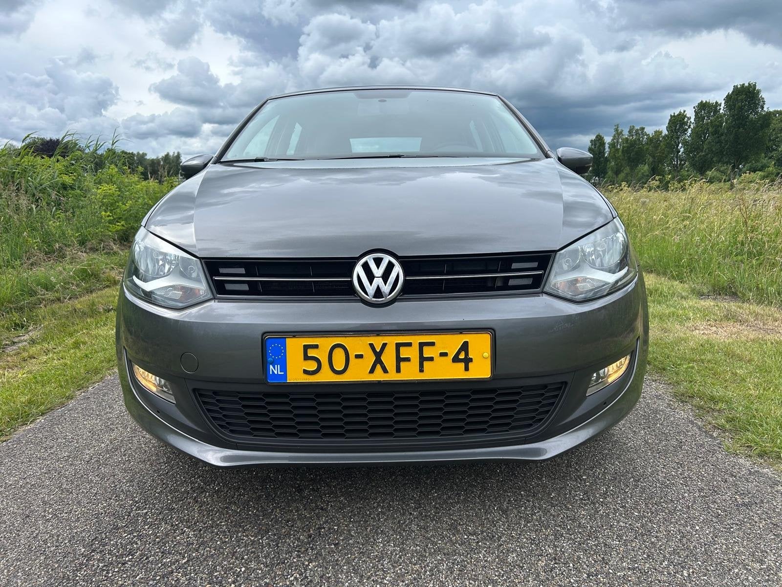 Volkswagen Polo 1.2 TSI BlueMotion Comfort Edition | Cruise, Voorwielaandrijving, Euro 5, Stof, Zwart