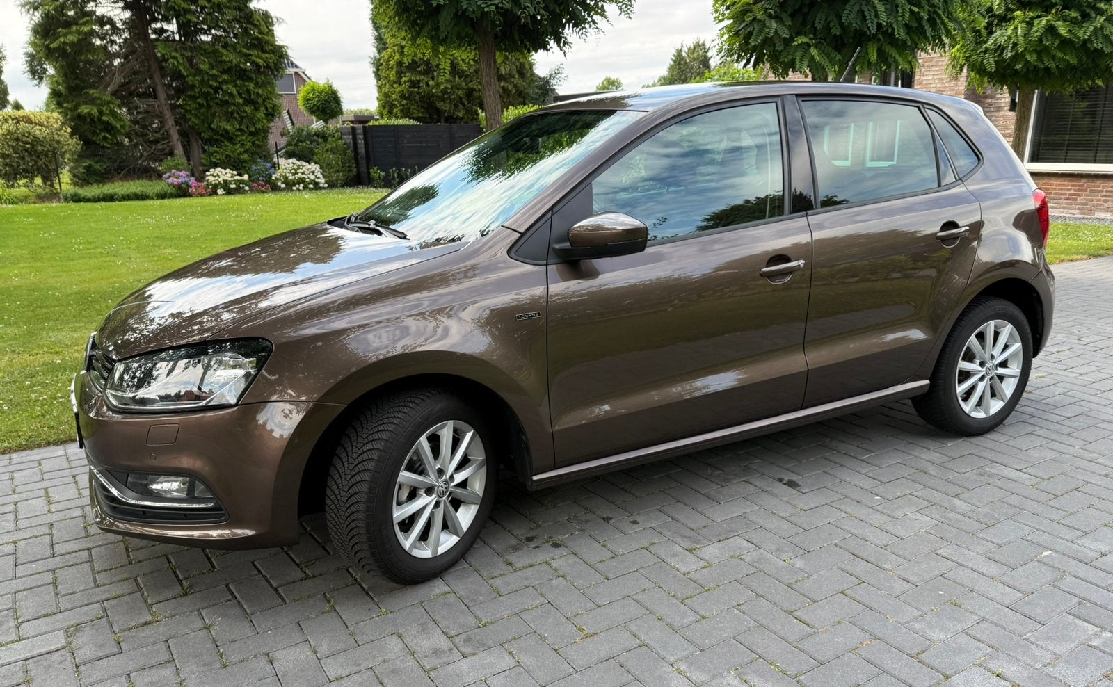Volkswagen Polo 1.0 Lounge / 2015 / 105.000 km / benzine, Voorwielaandrijving, Bruin, Handgeschakeld, Grijs