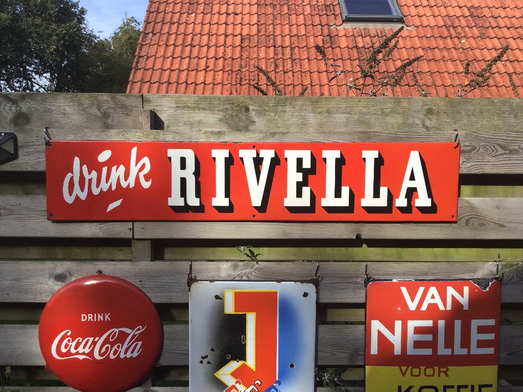 Rivella emaille reclamebord, Ophalen, Gebruikt, Reclamebord