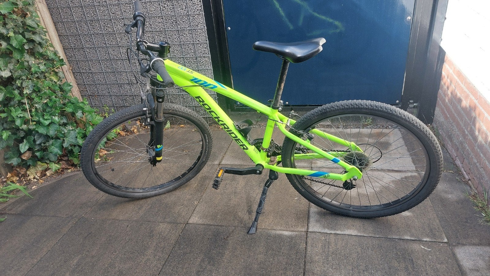 Rockrider ST100 mountainbike kind 26 inch neon geel, Fietsen en Brommers, Fietsen | Crossfietsen en BMX, Ophalen, 24 inch of meer