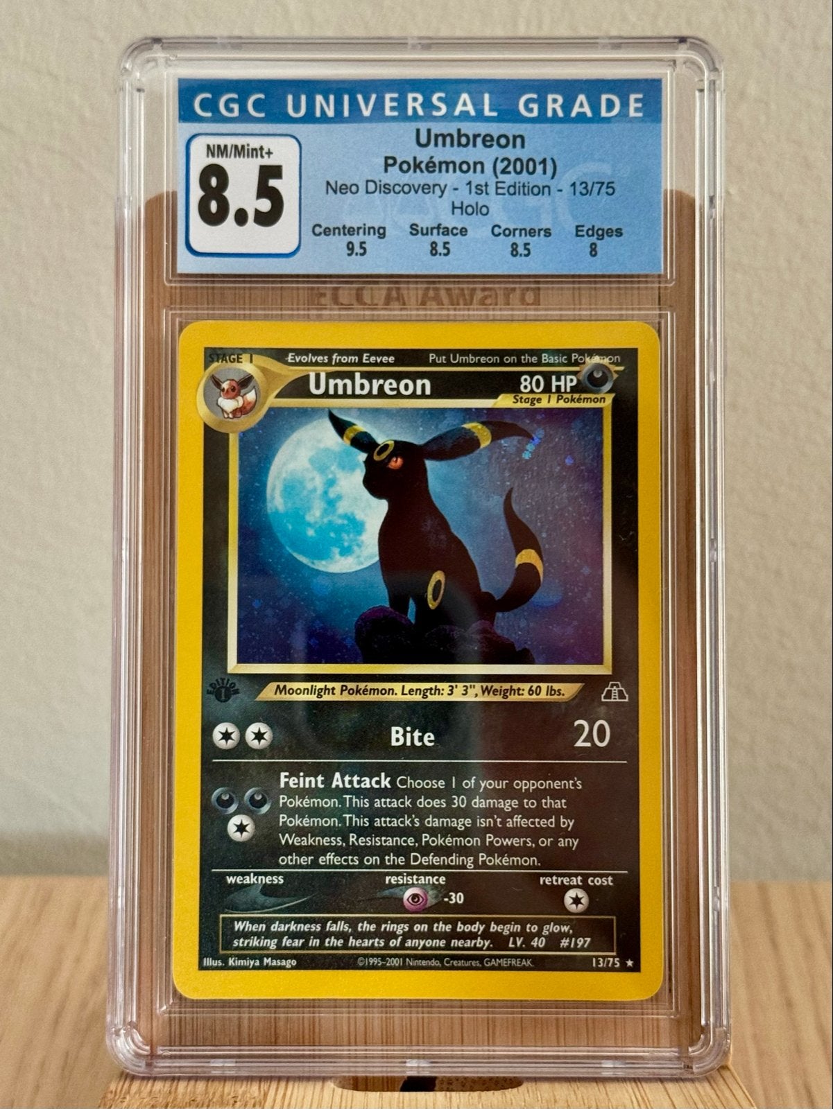 Umbreon Pokémon (2001) Neo Discovery 1st Edition CGC 8,5, Hobby en Vrije tijd, Verzamelkaartspellen | Pokémon, Ophalen of Verzenden