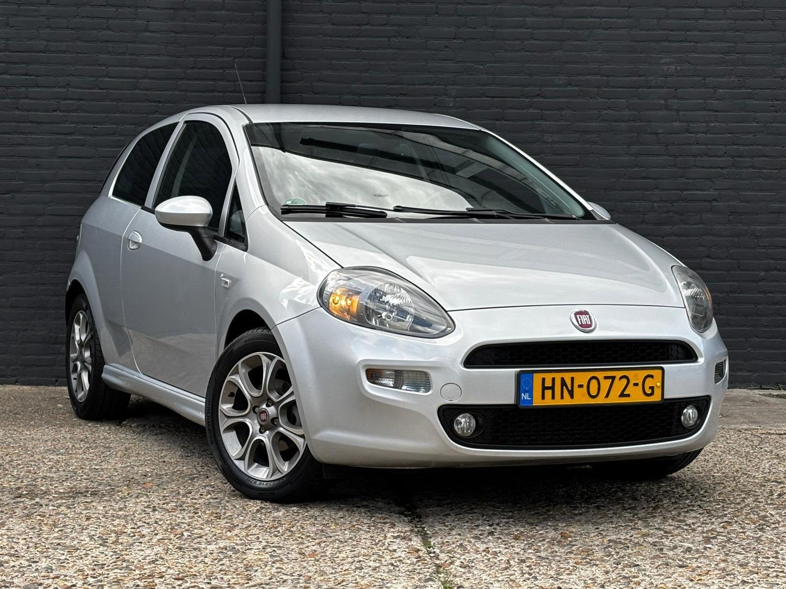 Fiat Punto Evo 1.3 M-Jet Lounge TREKHAAK|AIRCO, Auto's, Voorwielaandrijving, Euro 5, Gebruikt, Zwart