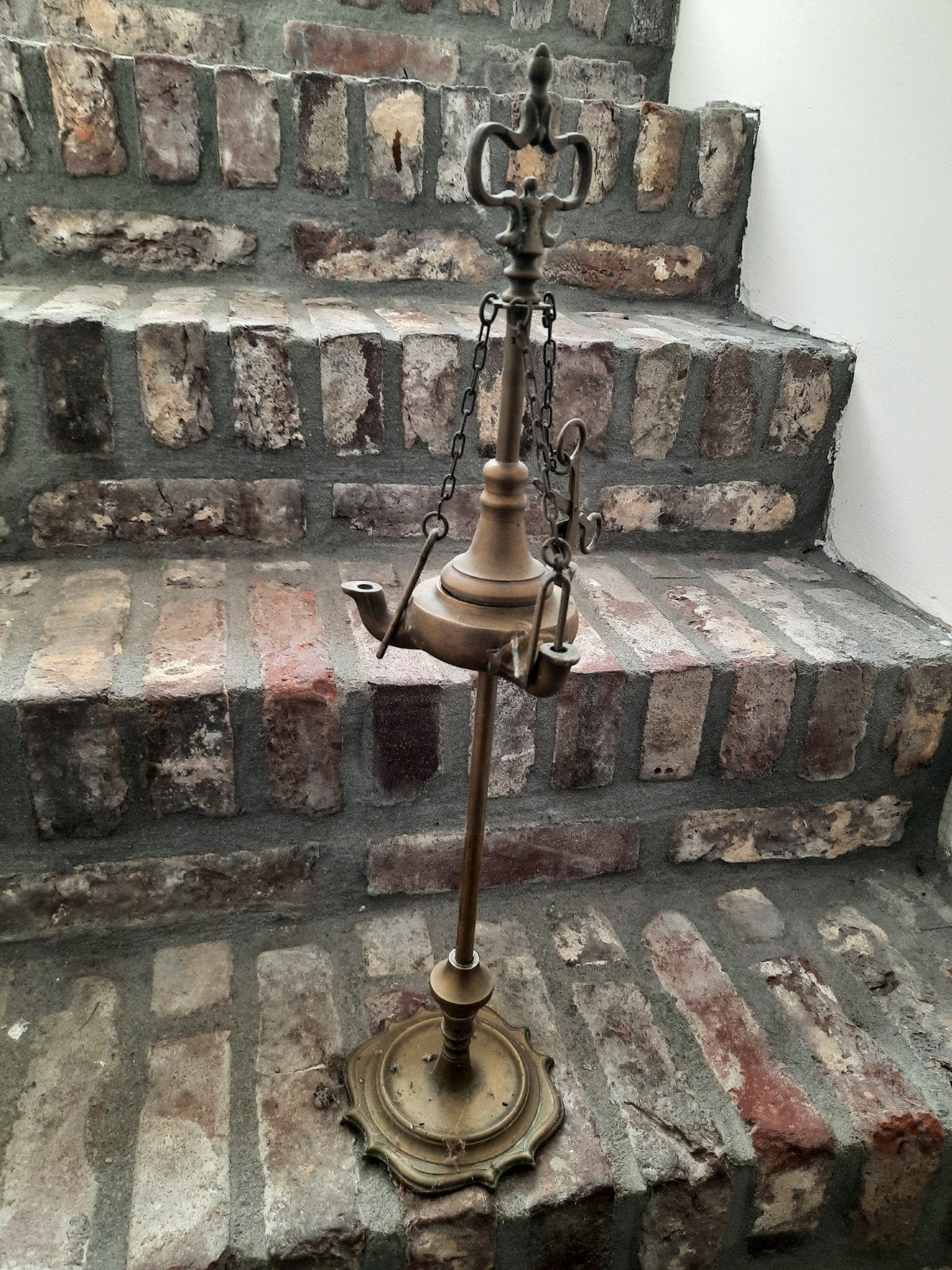 Antieke Florentijnse olielamp, Ophalen
