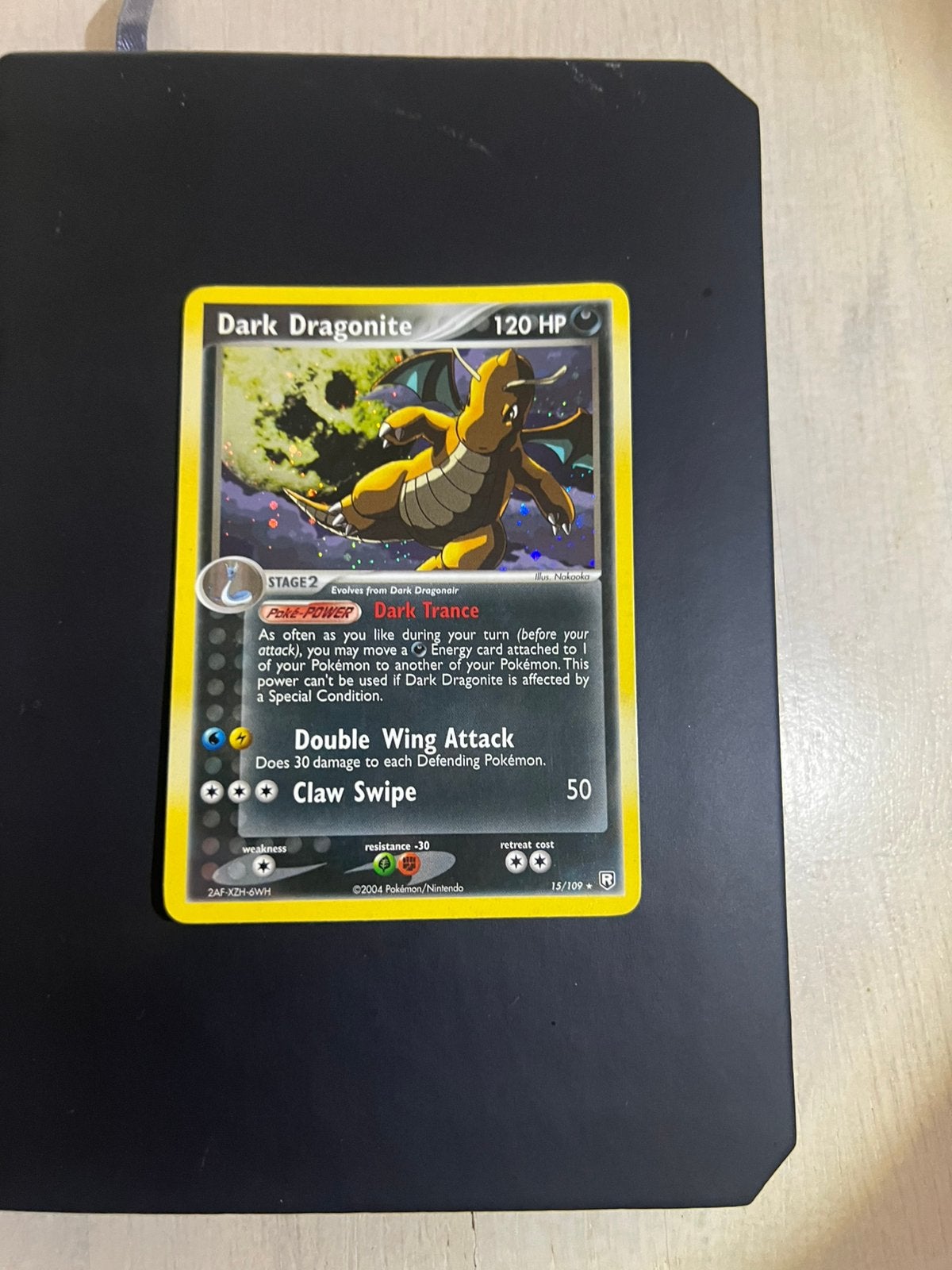 🐉 Dark Dragonite 15/109 – EX Team Rocket Returns (2004), Ophalen of Verzenden, Zo goed als nieuw, Losse kaart, Foil