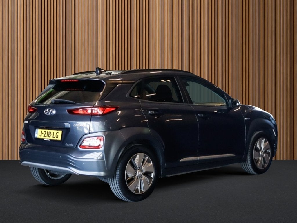 Hyundai Kona EV Comfort 64 kWh 3-Fase 1e-Eig. & Dealer-Onder, Auto's, 12 maanden, Gebruikt, Zwart, Origineel Nederlands