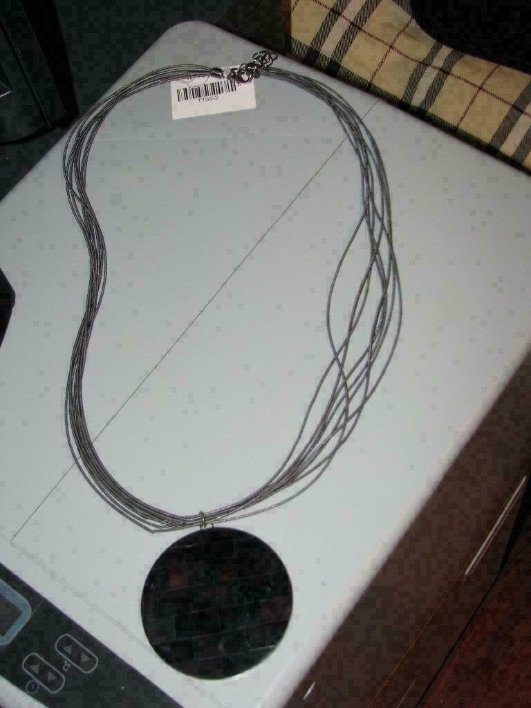 Nieuwe lange ketting van Manouk, zilver/zwart/bruine schijf., Ophalen of Verzenden, Nieuw, Zwart