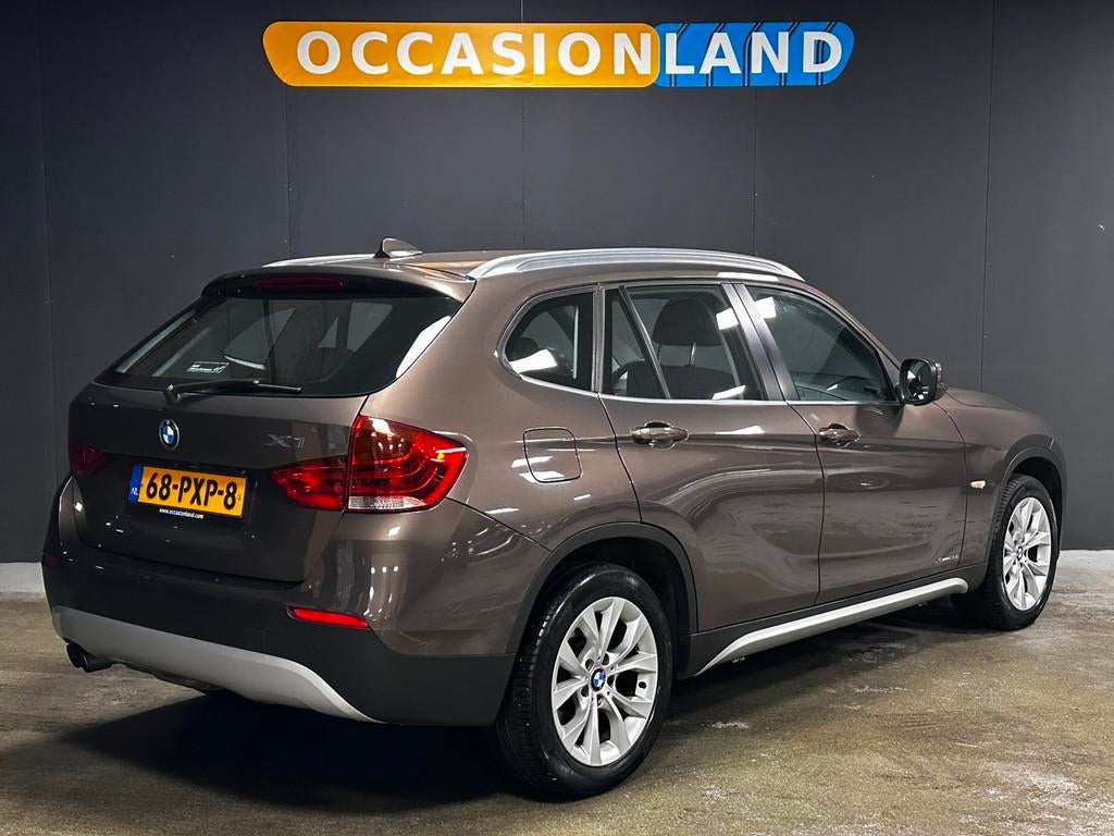 BMW X1 XDrive28i Executive|AUTOMAAT|CRUISE|BLUETOOTH|NAVI|CA, Auto's, BMW, Euro 5, Stof, Gebruikt, Zwart