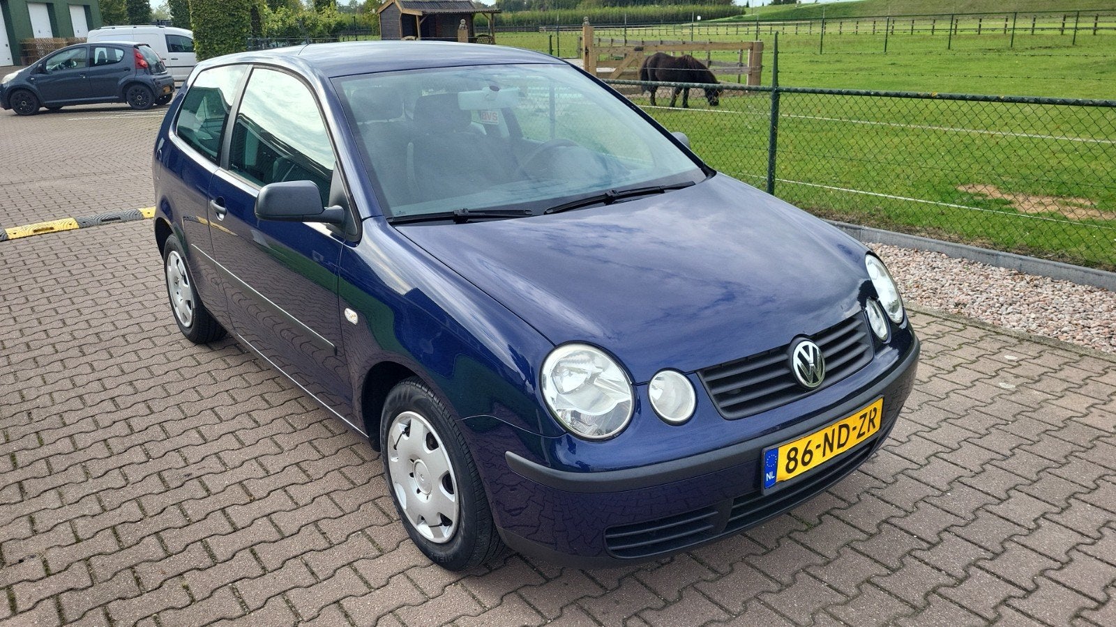 Volkswagen Polo 1.2  2003 Blauw met airco en apk!, Zwart, 4 cilinders, Blauw, 1198 cc