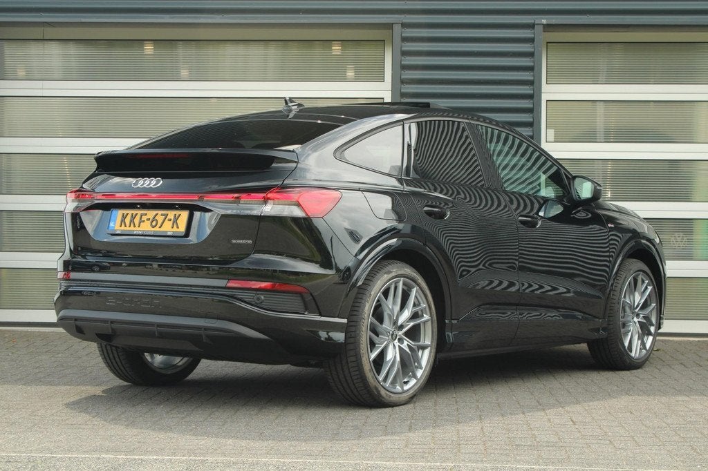 Audi Q4 Sportback e-tron 45 286pk quattro S Edition Competit, Auto's, Audi, Automaat, 12 maanden, Zwart, 82 kWh