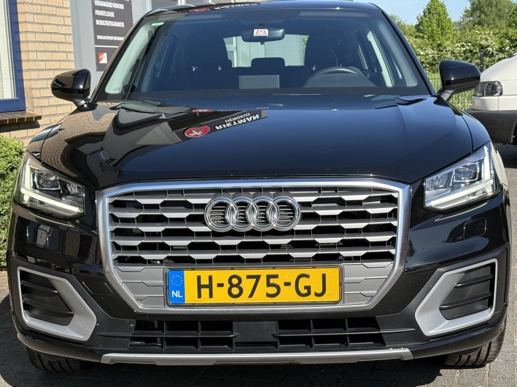 Audi Q2 30 TFSI Sport TREKHAAK-NAVI-CRUISE -12 MND MOBILITEI, Dealer onderhouden, Gebruikt, 116 pk, Zwart