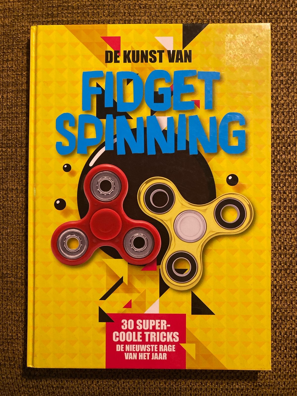 De Kunst van Fidget Spinning: 30 Supercoole Tricks, Ophalen of Verzenden, Gelezen, Non-fictie