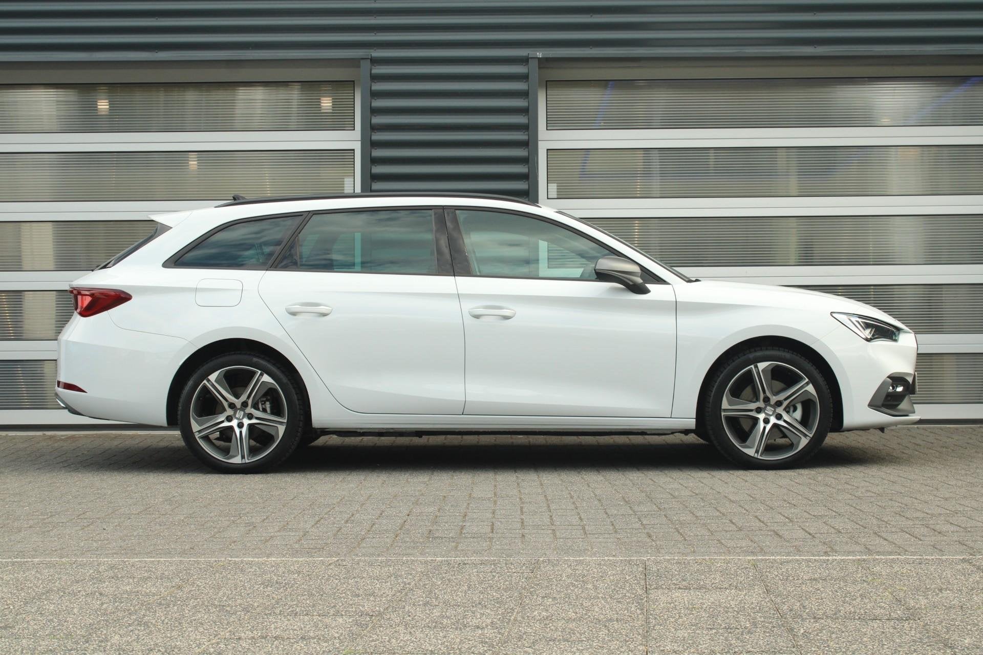 SEAT Leon Sportstourer 1.5 TSI 204pk DSG e-Hybrid FR Busines, Auto's, Seat, 12 maanden, Stof, 4 cilinders, 1700 kg