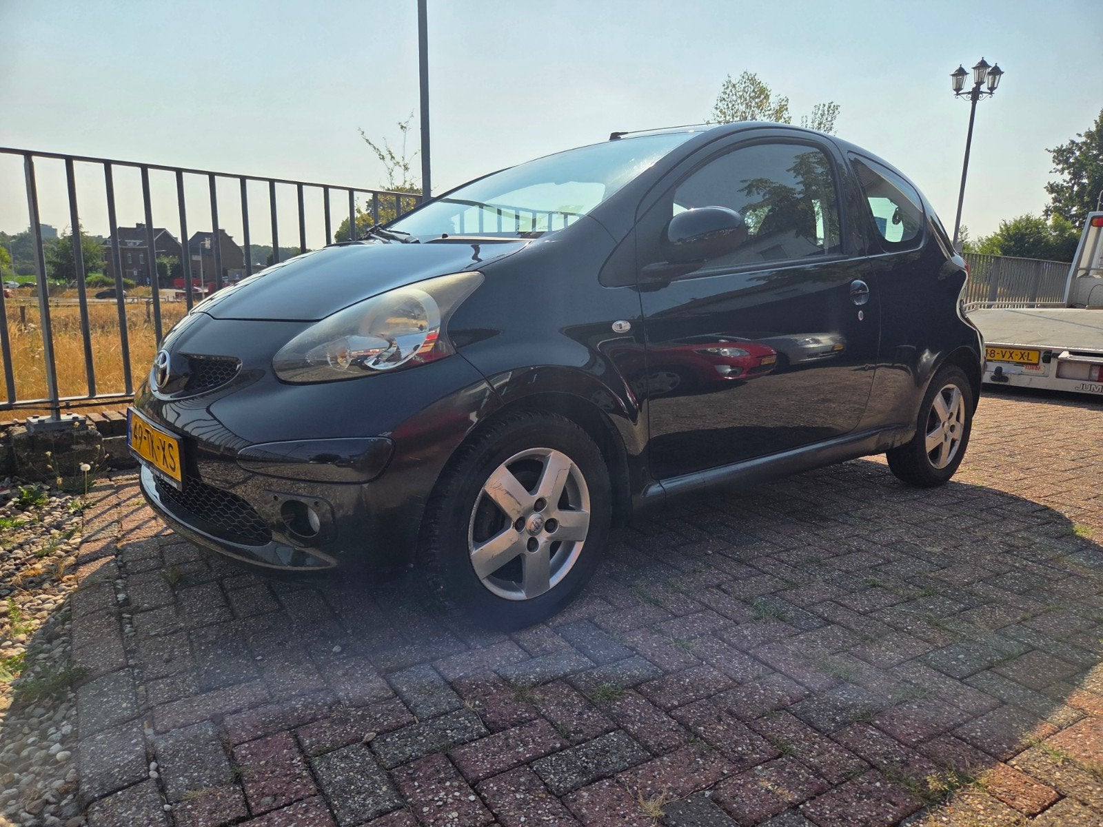 Toyota Aygo 1.0 12V Vvt-i 3DRS MMT 2006 Zwart, Auto's, Toyota, Voorwielaandrijving, Stof, Metallic lak, Zwart