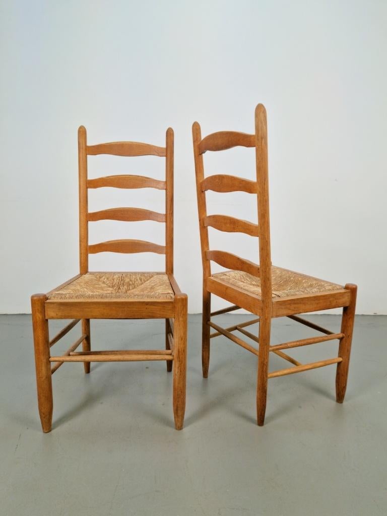 Set brutalist charlotte perriand ladder stoel hout riet ‘60