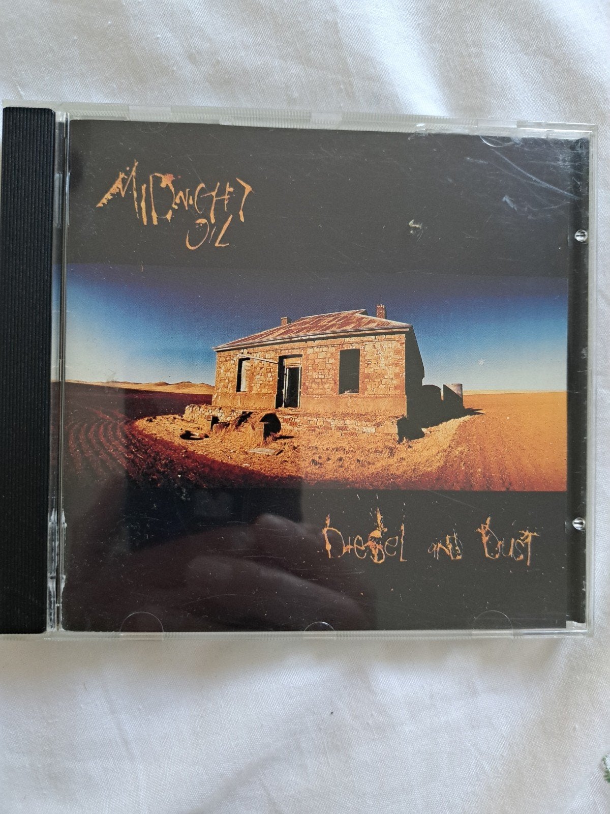 Midnight oil, Ophalen of Verzenden, Gebruikt