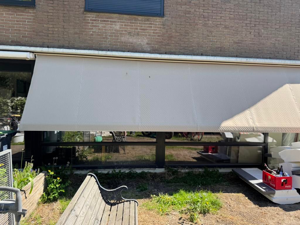 Elektrisch zonneluifel van 6.70m met knikarm, Tuin en Terras, Zonneschermen, Ophalen, Gebruikt, 450 cm of meer, Elektrisch