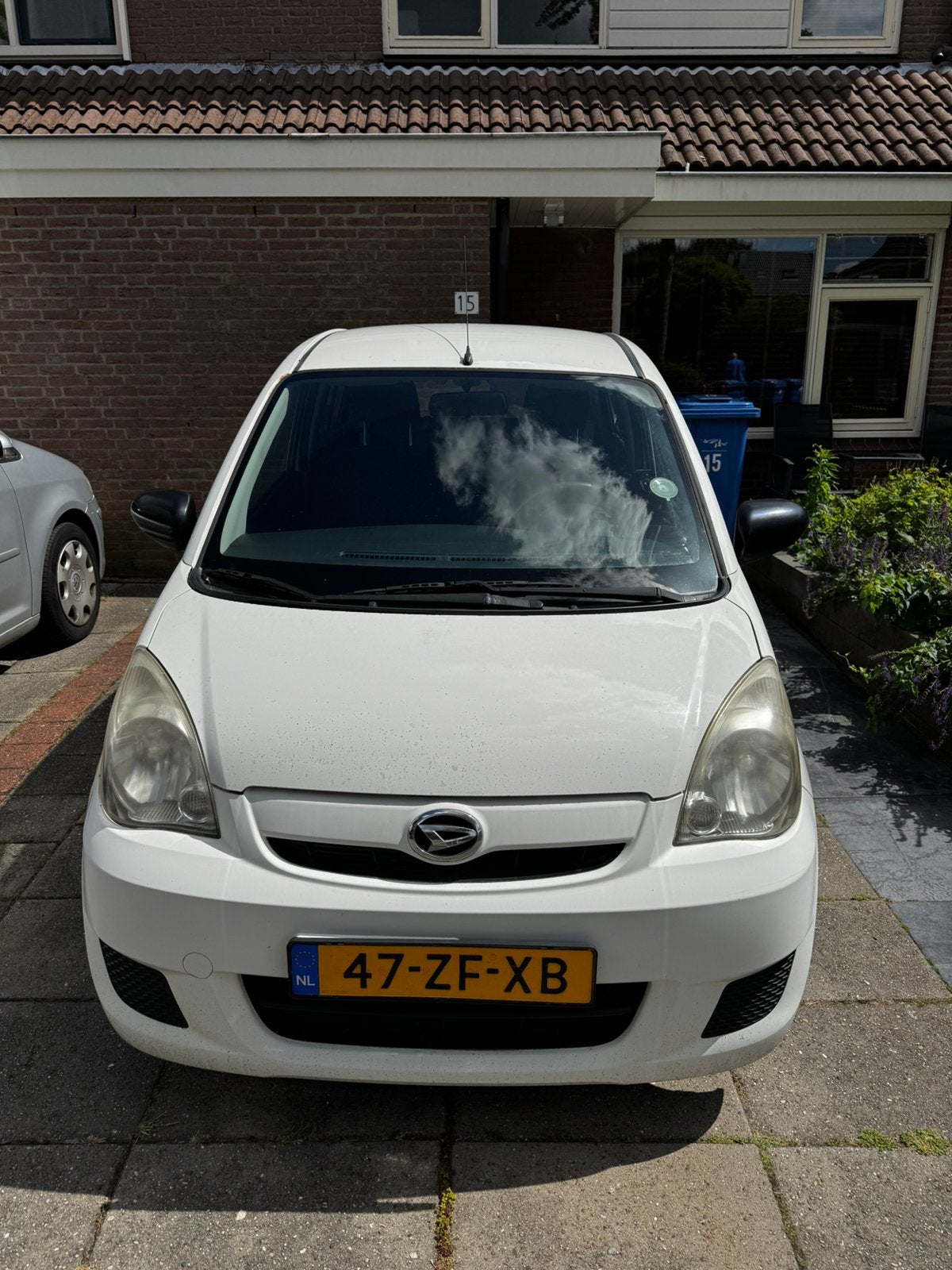 Daihatsu Cuore 1.0 5D 2008 Wit, Auto's, Daihatsu, Voorwielaandrijving, Stof, 600 kg, Zwart