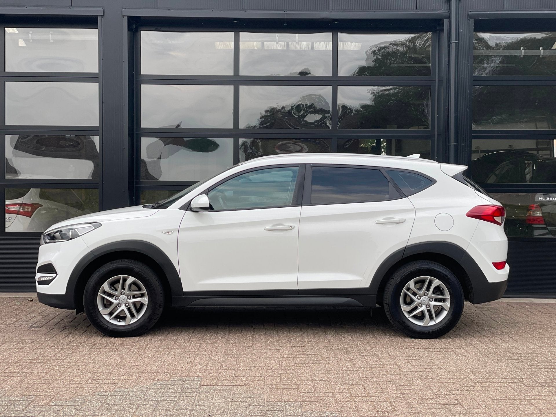 Hyundai Tucson 1.6 GDi Comfort, Auto's, Voorwielaandrijving, Stof, Gebruikt, 4 cilinders