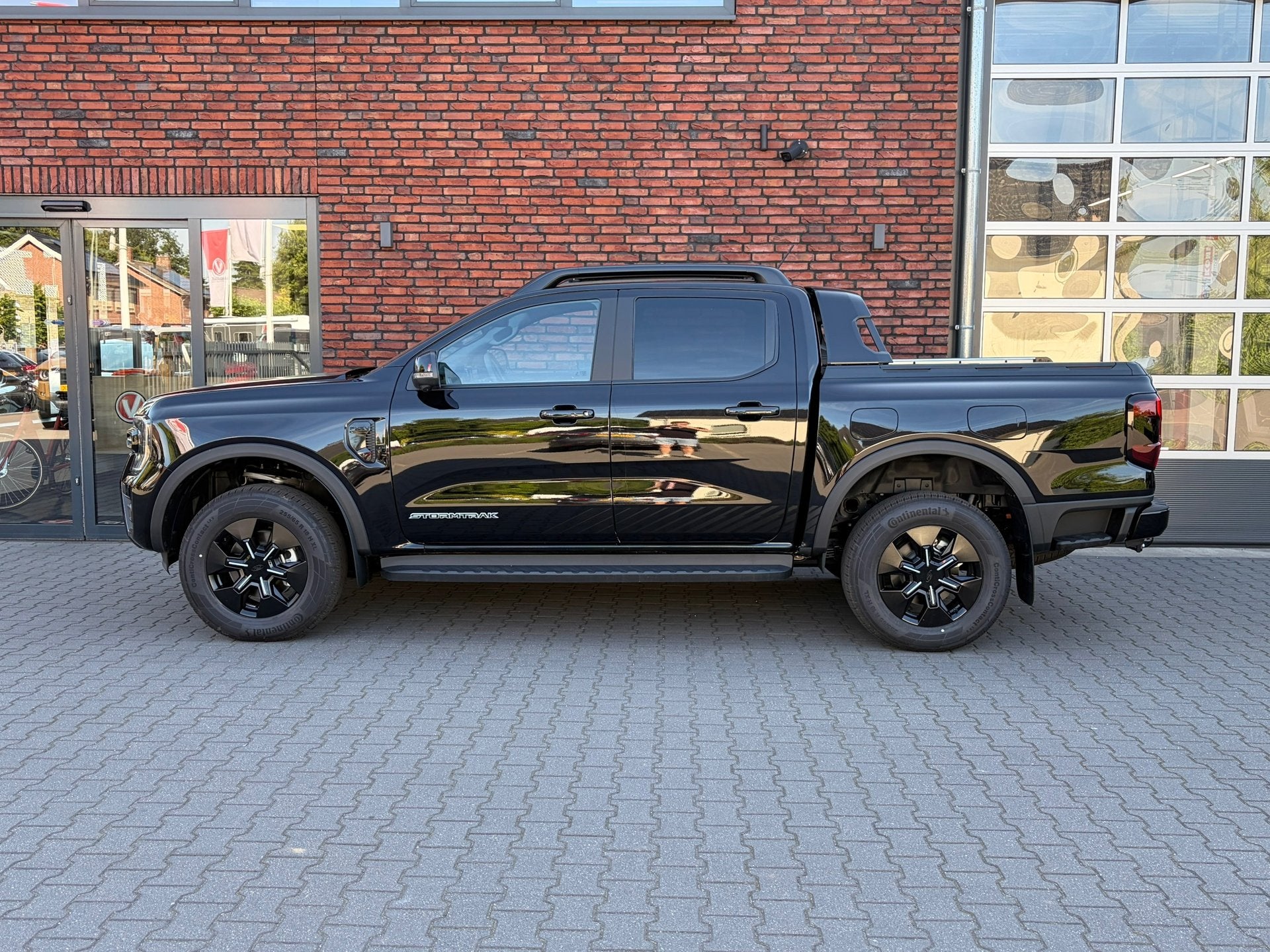 Ford Ranger 2.3 PHEV e-4WD Stormtrak Full Option 3500Kg Trek, Auto's, 12 maanden, 4 cilinders, Origineel Nederlands, Bedrijf