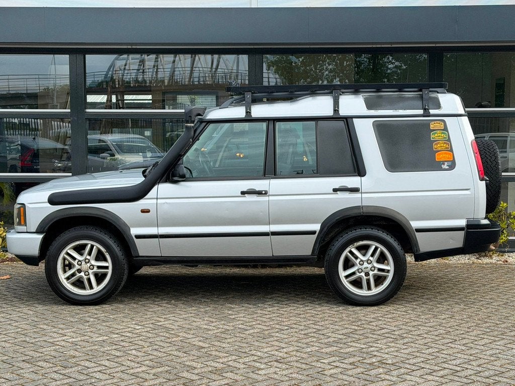 Land Rover Discovery 2.5 Td5 E Imperial NAP APK !, Auto's, Automaat, Zwart, 2495 cc, 139 pk