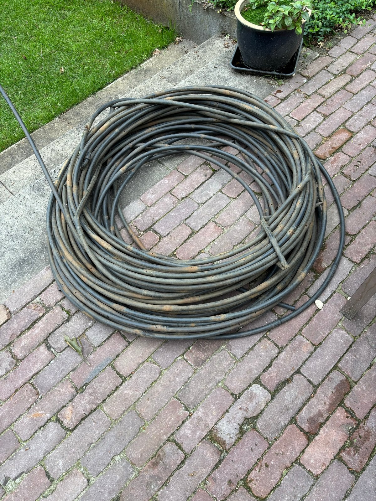 Druppelslang voor efficiënte tuinirrigatie, Tuin en Terras, Tuinslangen, Ophalen, Gebruikt, Tuinslang